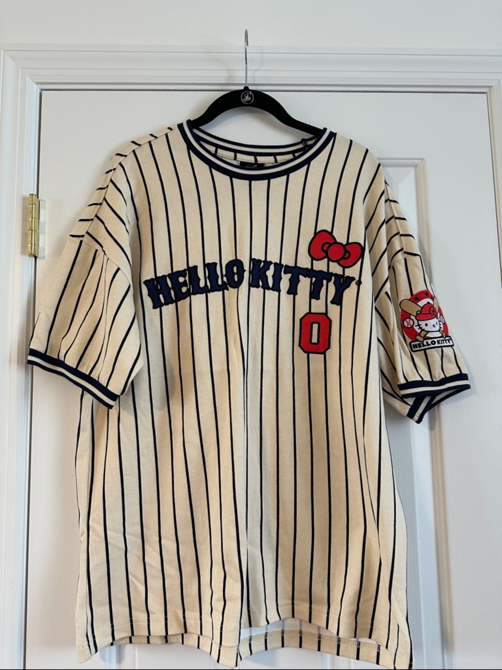 Hello Kitty Cream and Navy Pinstripe Baseball Tee with Red Accent